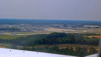  - About to touch down at CLT - by Murat Tanyel