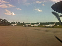  @ Treasure Cay Airport - Parked planes as we taxi to the gate at TCB - by Murat Tanyel