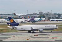  - A huge outbounder on rwy 25C is waiting for a tiny inbounder on rwy 25L...... - by Holger Zengler