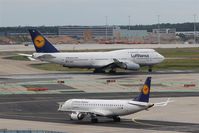  - Some feet and 19 years on duty are between those two at rwy 25C.... - by Holger Zengler
