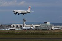  - A croation Airbus above rwy 25L, a waiting Jumbo from Hong Kong on rwy 25C and a Boeing from US taxiing to apron - a view on Frankfurt Airport from southeast.  - by Holger Zengler
