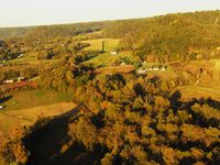 - Approaching from the SW on a long final for RWY 6 on this gorgeous autumn day in 2011. - by Robert C. Wilmoth