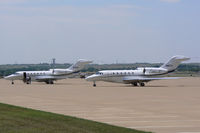  @ Fort Worth Alliance Airport - Both of Textron's jets on the ramp in front of the Bell Helicopter Hanger - by Zane Adams