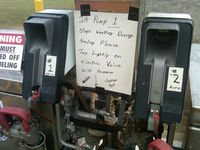  - Funny sign at the airport.   - by R. Wheeler