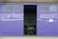  - New paintwork on a hangar at Cranfield Airport - by Paul Ashby