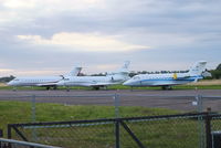  - bizjets parked at Cranfield with visitors for the opening of the London 2012 Olympic games. From L to R are N1812C, N747RL and HB-JRQ - by Chris Hall