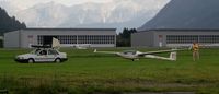  - The old and well-known Volvo car is day in, day out, crossing over the proper runway and taxiways of Zell Am See Flugplatz. But this pulling of glideplanes is also a perfect task for the car.  - by Jorrit de Bruin