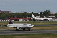  - The TXL way: Arrival from rwy 08L is crossing rwy 08R for taxiing to gate 9. - by Holger Zengler