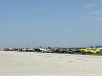  - 2012 Wings Over Camarillo Airshow, some featured airshow aircraft on the ready ramp including Rob Harrison's N666XC yellow ZLIN 'Tumbling Bear' on the right - by Doug Robertson