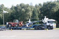  - Removal of R22 display exhibit from airport entrance - by OldOlympic