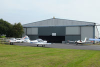  - the main hangar at Shobdon Airfield, Herefordshire - by Chris Hall