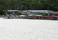  - This seaplane base is located deep within beautiful Charlotte Amalie harbor; the international airport is Cyril E. King Airport. - by Daniel L. Berek