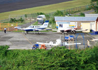  - This is one of the general aviation ramps and maintenance areas at SLU. - by Daniel L. Berek
