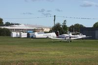  - Airport so small it doesn't have any buildings, just a few glider trailers - by Florida Metal