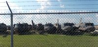  - AIRPORT HAS A LARGE BONE YARD OF MASH HELICOPTERS - by dennisheal