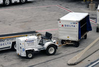  - Tug mit baggage cart - by Ronald Barker