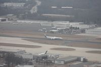  - Further down, as we still can see the ATI DC-8 coming to a stop on the runway.  One of Jack Roush (NASCAR owner) former 727-100s sitting without engines on the ramp - by Florida Metal