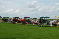  - four Fokker DR.1 replicas at the 2012 Sywell Airshow - by Chris Hall
