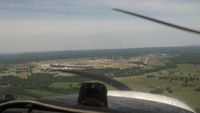  @ Talladega Municipal Airport - On final for runway 3 with the race track off to the left - by dms65aaf