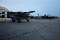  @ Grimes Field Airport - B-25's starting up at dawn for the flight to Dayton. - by Bob Simmermon