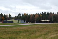  @ Feringe Airport - View of the hangars at Feringe: left the hangar of Smålands Fallskärmklubb (parachutist club) and right the hangar of Feringe Flygklubb. - by Henk van Capelle