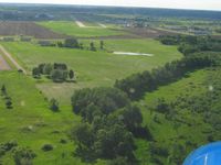  @ L O Simenstad Municipal Airport - Turning base to final RWY 28. - by Bob Simmermon