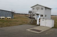  @ Henning Municipal Airport - Fuel pump and AD building at Henning Municipal Airport in Henning, MN. - by Kreg Anderson