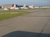  @ Butler Co Rgnl-hogan Field Airport - Planes lined up on the ramp in Hamilton, Ohio - by Bob Simmermon