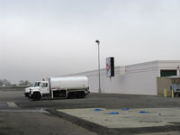  - New fuel supplier-AVFUEL replaced BP Fuel at Golden West Aviation fuel dock for 100LL. Jet-A and Jet-A-Prist. Foggy day. - by Doug Robertson