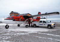  @ Grise Fiord Airport - Ramp at Grise Fiord with the terminal building in the background. - by Tim Kalushka