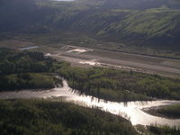  - Looking at the apron and threshold of runway 20 at Dawson City. - by Tim Kalushka