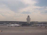  - LaGuardia terminal through the window of an arriving flight - by Jim Donten