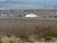  @ Inyokern Airport - The large white building in the center of the picture is the Kodiak hanger at Inyokern. Supposedly named after a type of hanger first built in Alaska, this hanger was built by the U.S. Navy in 1943 when Inyokern was used for ordinance testing. - by Bo Shaw