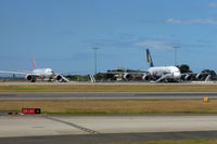  - Virgin Australia B777 and Singapore Airlines A 380 on a remote stand - by Micha Lueck