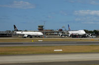  - Air China A330 and United Airlines B747 on a remote stand - by Micha Lueck