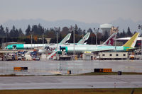  - At Boeing: 2 EK 777, 1 QR 787, 1 DHL (?) 767 - by Micha Lueck
