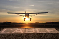  - Sunset photo of N9770E taken by Kevin Cable. - by Marty Kusch