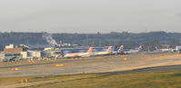  - Edinburgh airport taken from the train while on my way to Leuchars - by Mike stanners