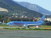  - This 737 is on its way to the hold for RW13 at AGP. Photo taken from the museum. - by Guitarist