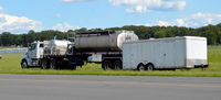  @ Orange County Airport - Ag equipment supporting N651HA - by Ronald Barker