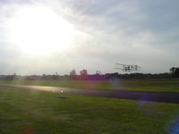  - EAA Chapter's Wright Flyer, flying over RW28 - by tshiverd
