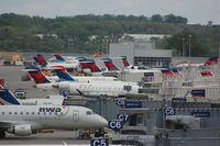  - Busy commuter terminal at MSP during the transition of NW to DL in 2010. - by FerryPNL