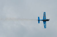  - an extra 300, a member of the Blades team, in action at Leuchars airshow 2011 - by Mike stanners