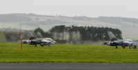  - A Pair of AG-51 Tornado IDS ,46+22 & 44+78,roar down runway 27 on an afternoon Joint warrior sortie - by Mike stanners