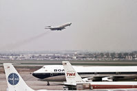  - A view across Heathrow Airport as a VC-10 of East African Airways lifts off. In the foreground, three of the major players in the aviation industry in the 70's. - by Harry Longden