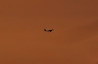  - Evening departure for a local flight. - by Roger Winser