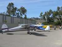  - A trio of early sharp Cessna ragwing trainers on display at Aviation Museum of Santa Paula ramp First Sunday Fly-In and Hangar crawl. N140BL C140, N90067 C140 refinished and N3157N C120.  - by Doug Robertson
