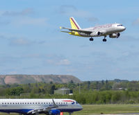  - Germanwings A319-132 D-AGWM comes in to Land from CGN While EMB190-100SR G-LCYJ Waits to enter runway 06 for departure to LCY - by Mike stanners