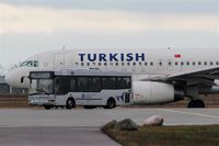 - Airport tour bus in front of leaving TURKISH jet on apron 1..... - by Holger Zengler