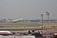  - A 747-400, one of Air India's fleet of 6 aircraft, lifts off at Heathrow. The airports never ending alterations continue to take place in the foreground. - by Harry Longden